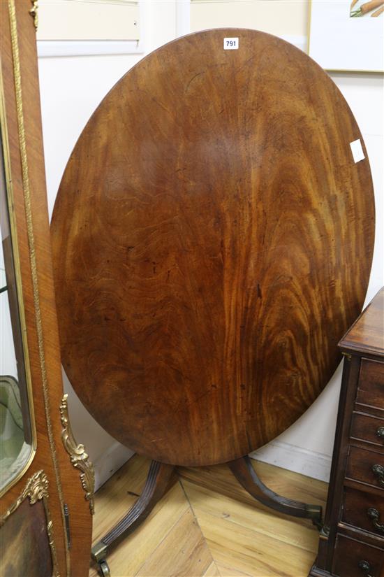 A late Georgian mahogany oval breakfast table, W.111m